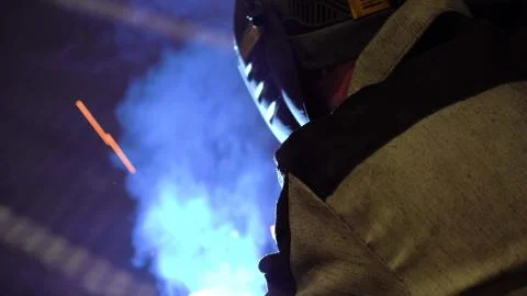 The work of the welder. Welding work in the factory floor Stock Photos