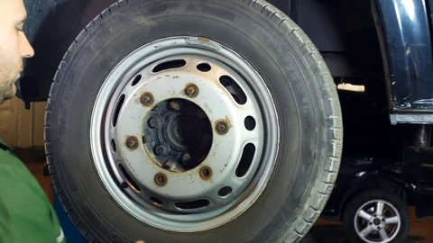 Work on the wheel of the truck Stock Footage 72114277
