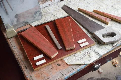 Work of woodworker on table saw construction Stock Photos