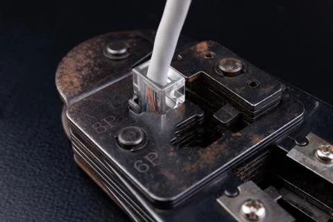 Work in a workshop on connections used in electronics. Computer cables and co Stock Photos