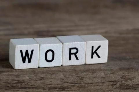 Work, written in cubes Stock Photos