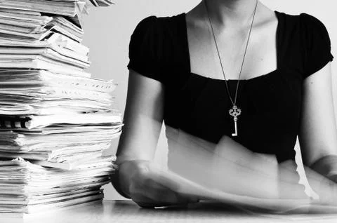 Workaholic surrounded by papers Stock Photos