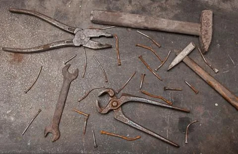Workbench with rusty tools Stock Photos