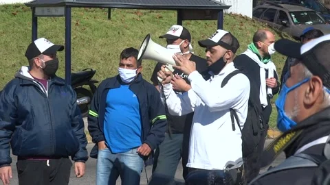 Worker is about to speak to those present 스톡 동영상 130307934