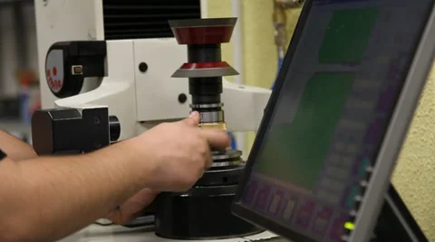 Worker adjusting grinding wheel Stock Footage 36846944