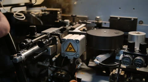 Worker adjusts edge banding machine Video stock 61526815