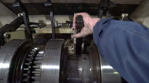 The worker adjusts the machine. Repair transmission unit Stock Footage 75330256