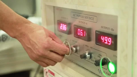 Worker adjusts measuring equipment for testing in laboratory Stock Footage 162911649