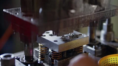 Worker adjusts metal mold with gloved hands Stock Footage 340269209