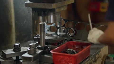 Worker adjusts metal mold with gloved hands 스톡 동영상 340269234