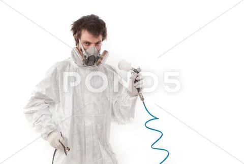 Worker with airbrush gun Stock Photos
