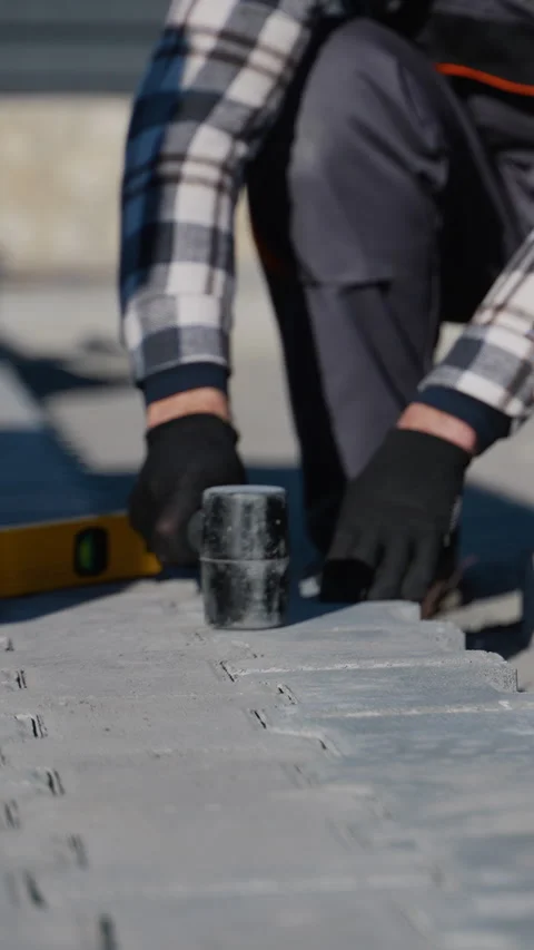 Worker Aligning Interlocking Paving Stones Stock Footage 297787278