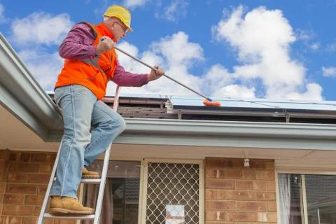 Worker and solar panels Stock Photos