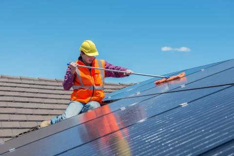 Worker and solar panels Stock Photos