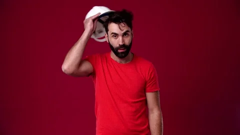 Worker and tired takes off the protective helmet from his head Stock Footage 165621605