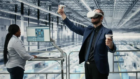Worker and woman using virtual reality simulation, monitoring semiconductors Stock Footage 333381932