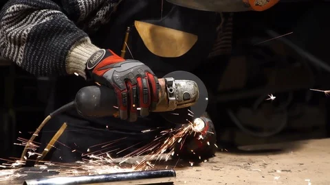 Worker With an Angle Grinder Stock Footage 126932345