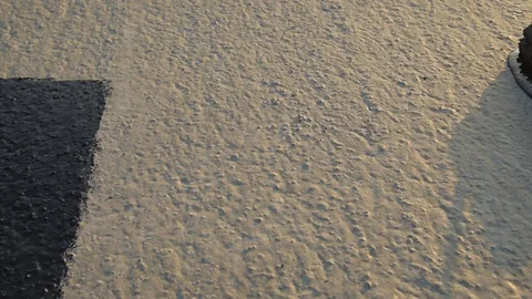 Worker applies bitumen mastic on the foundation Stock Footage 120480981