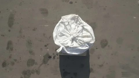 Worker applies labels to a white sack 스톡 동영상 79162267