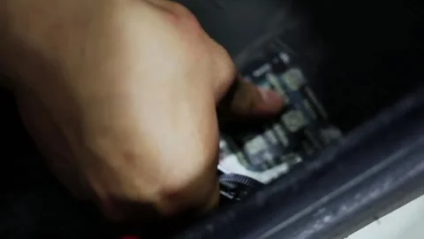 Worker applies patch and rolls it on internal surface of tyre during car wheel 스톡 동영상 276366512