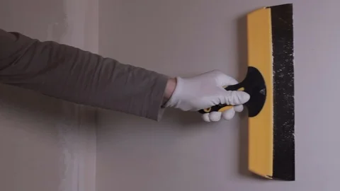 Worker Applies Plaster To The Wall With A Spatula Stock Footage 101317079