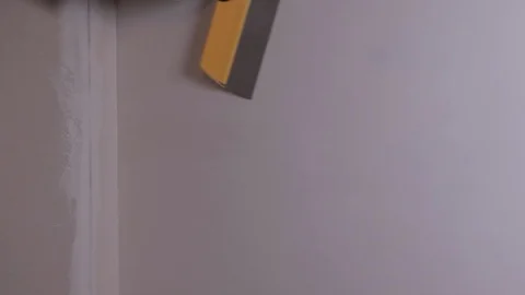 Worker Applies Plaster To The Wall With A Spatula Stock Footage 101317097