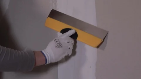 Worker Applies Plaster To The Wall With A Spatula Stock Footage 101317141