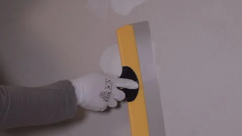 Worker Applies Plaster To The Wall With A Spatula Stock Footage 101317180
