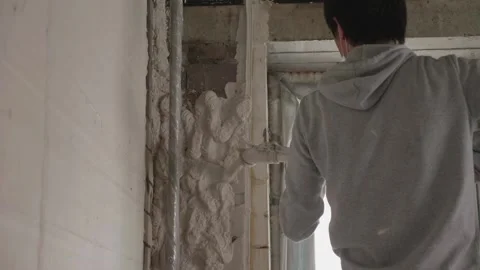 Worker apply plaster on the wall 10.06.2020 Stock Footage 132491981