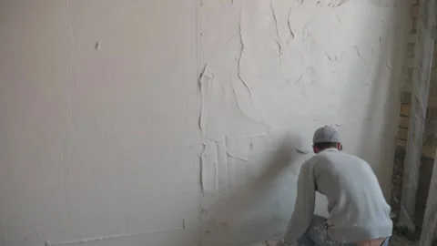 Worker apply plaster on the wall 10.06.2020 Stock Footage 132492102