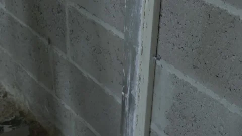 Worker apply plaster on the wall in pandemic 14.05.2020 Stock Footage 130426044