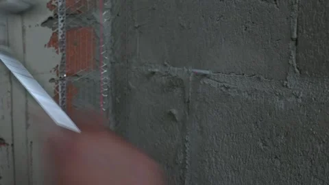 Worker apply plaster on the wall in pandemic 14.05.2020 Stock Footage 130426088