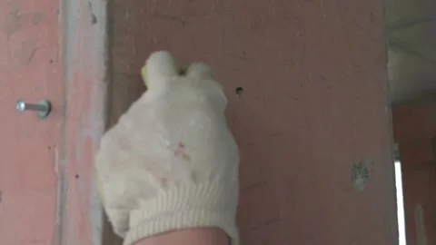 Worker apply plaster on the wall in pandemic 14.05.2020 Stock Footage 130426214