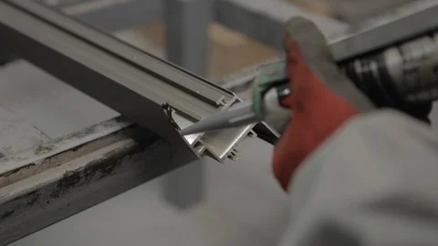 Worker applying black silicone sealing with caulking gun for moisture protection Video stock 110771422