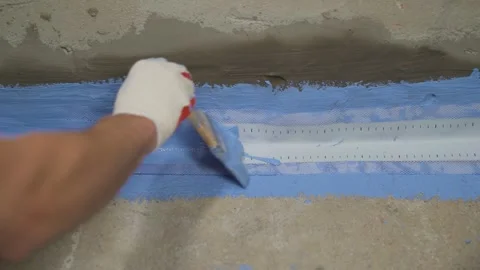 Worker Applying Blue Waterproofing Sealant Stock Footage 333379179