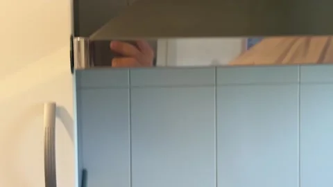 Worker applying fresh plaster on a ceiling for renovation Stock Footage 341362881