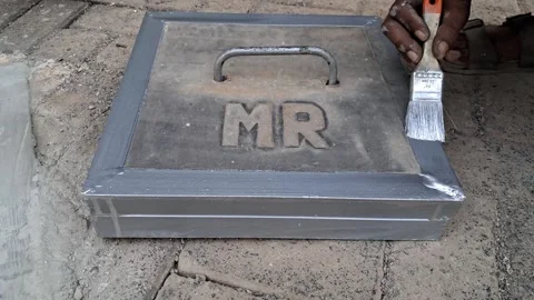 Worker Applying Grey Paint on Metal Hatch Door Video stock 343589046