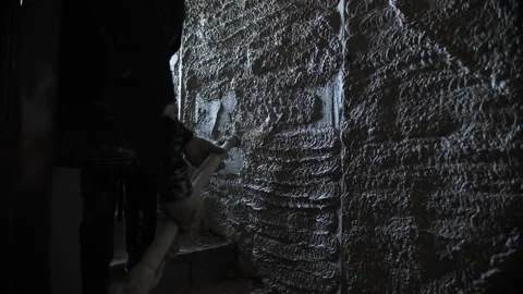 Worker Applying Sprayed Plaster to Wall Stock Footage 297497423