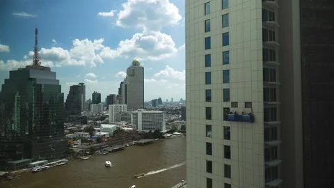 Worker are working outside the tall building in the capital. Video stock 129310595