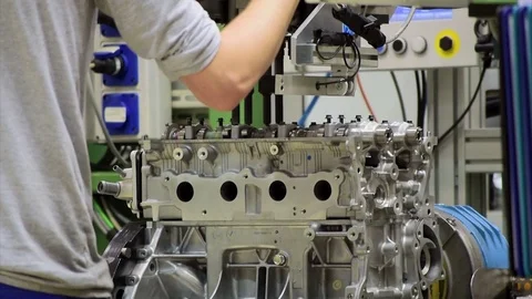 Worker assemble an automobile engine Stock-Footage 73414830