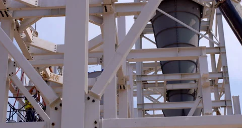 Worker assembler at a height assemble industrial equipment  Stock Footage 161992598