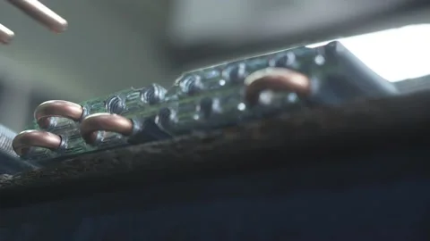 Worker assembles radiator for air conditioner Stock Footage 160498812
