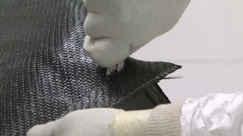Worker assembling carbon fibre Stock Footage 37090581