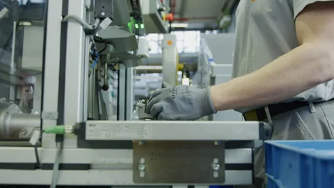 Worker assembling in High Tech Production Plant - Factory Stock Footage 167016137