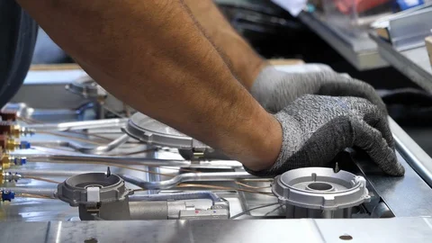 Worker on assembly line, close-up. Filmed in 4K Stock Footage 94414270
