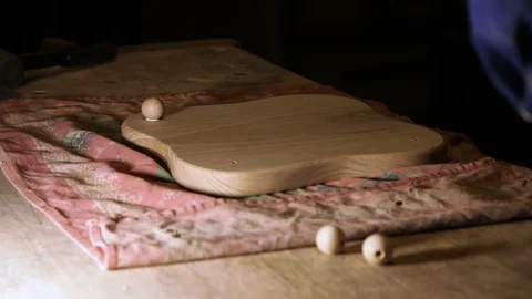 A worker attaches round elements on the woodwork in carpentry Stock Footage 100865495