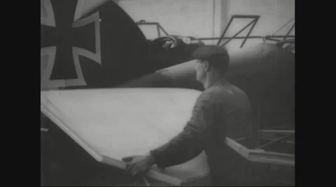Worker attaching aircraft wings to the fuselage Stock Footage 43311457
