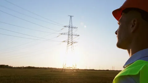 Worker on the background of the electric pole. Stock Footage 137457953