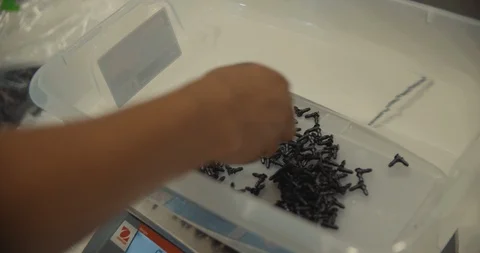 Worker Bags Screws 스톡 동영상 105390551