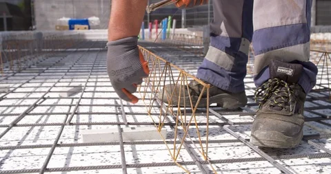 Worker braiding concrete at a building site Netherlands, 4K Stock Footage 111635734